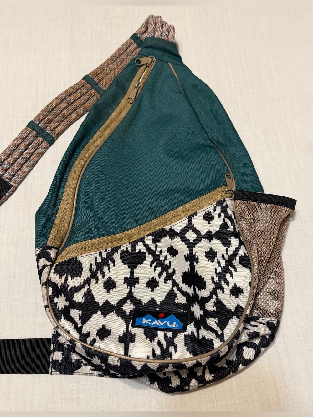 Kavu Paxton Teal Green & Black Ikat Rope Sling Pack with Tan Accents